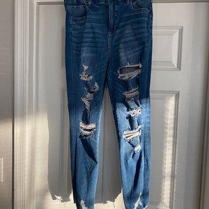 Distress blue jeans